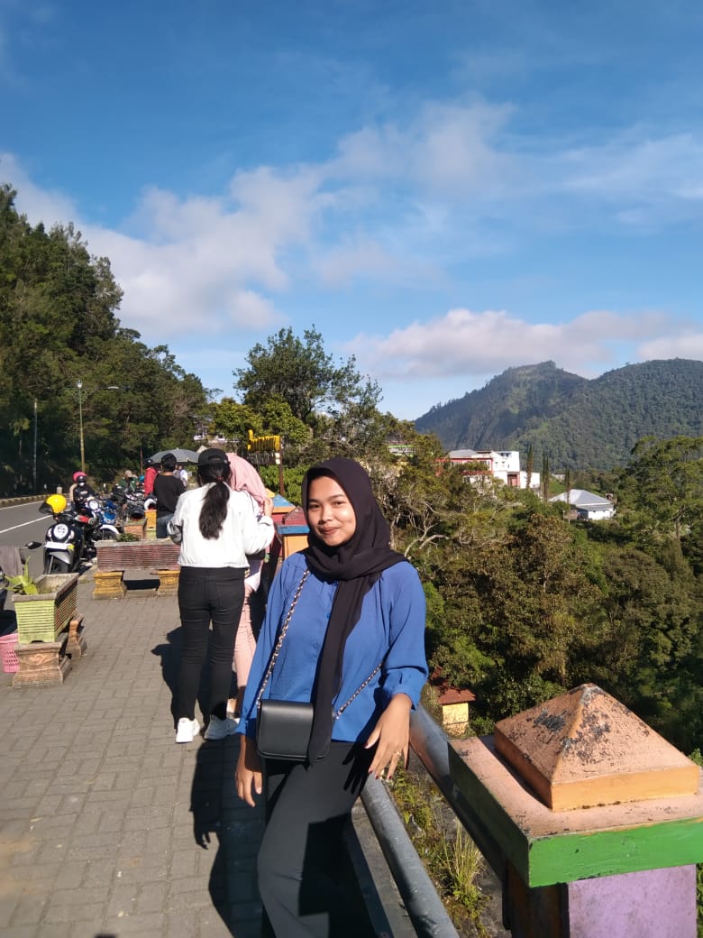 Profile image of a landscape with hills and a sky with clouds